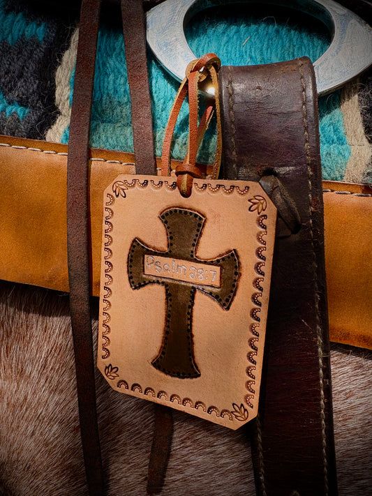 Cross saddle charm
